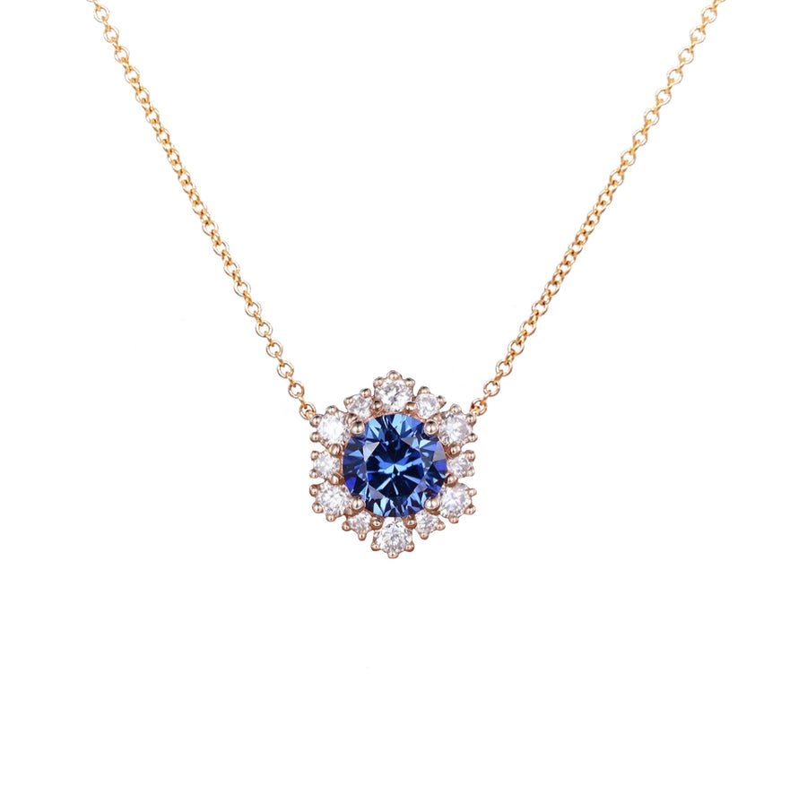 Exquisite Alara Floral Diamond Necklace meticulously crafted in 14K gold paired with a Flower Blue Sapphire Diamond Necklace in Rose Gold, highlighting elegant craftsmanship.