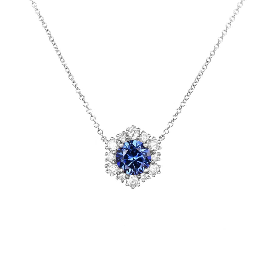 Exquisite Alara Floral Diamond Necklace meticulously crafted in 14K gold paired with a Flower Blue Sapphire Diamond Necklace in White Gold, highlighting elegant craftsmanship.