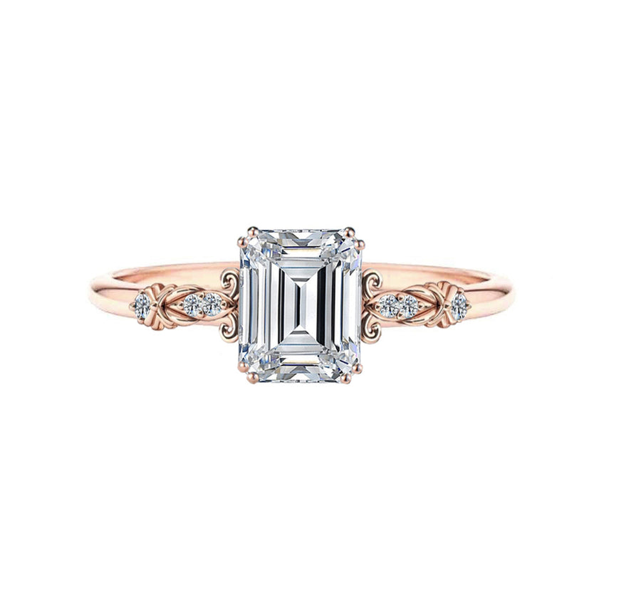 Vintage 2 carat emerald diamond engagement ring in rose gold