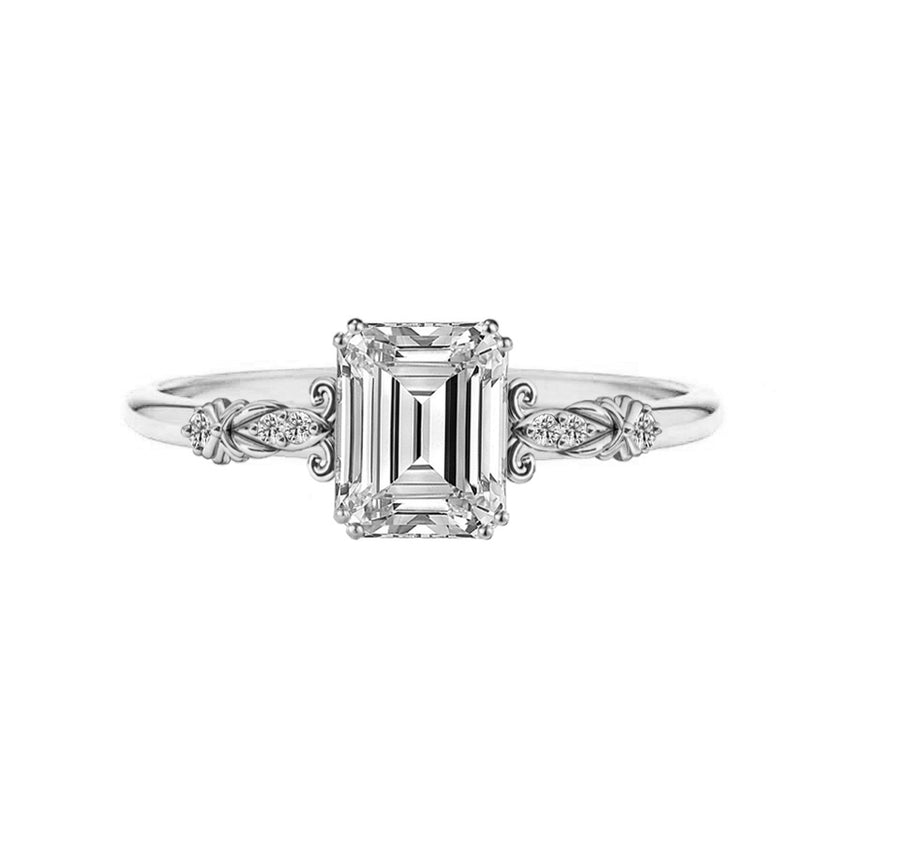 Vintage 2 carat emerald diamond engagement ring in white gold