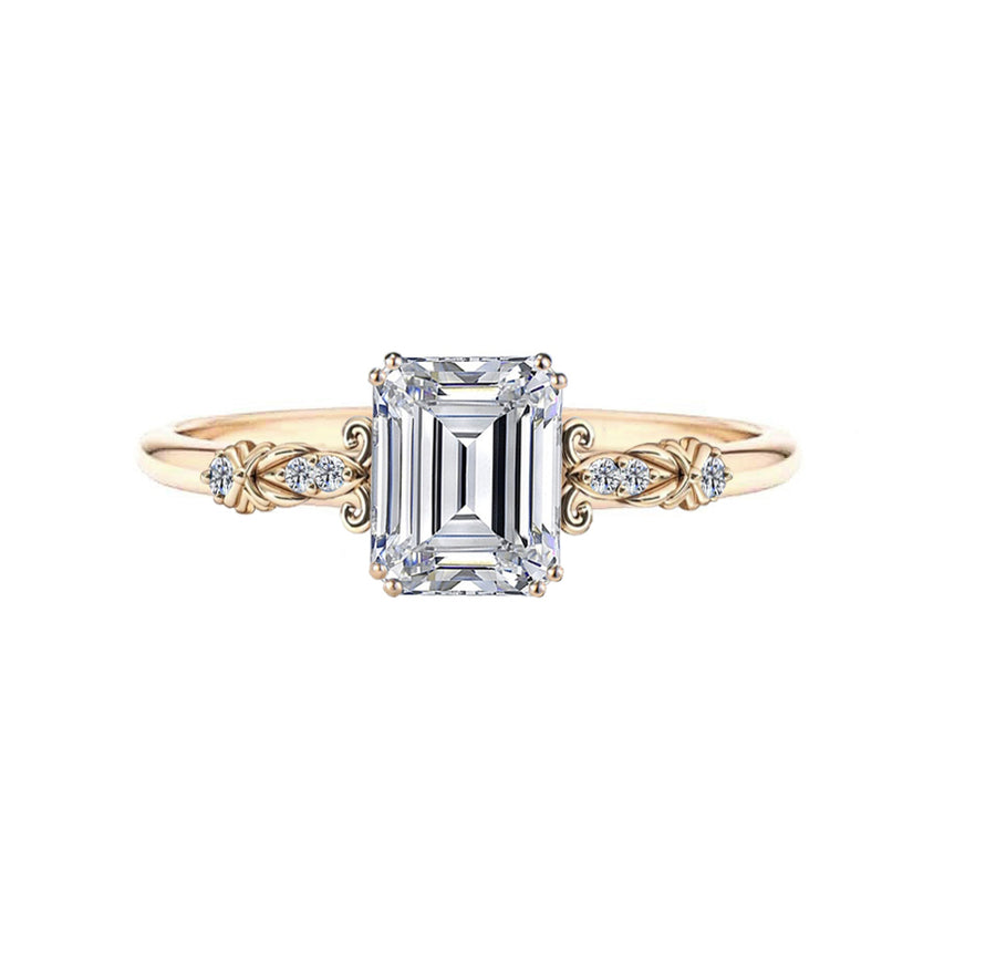 Vintage 2 carat emerald diamond engagement ring in yellow gold