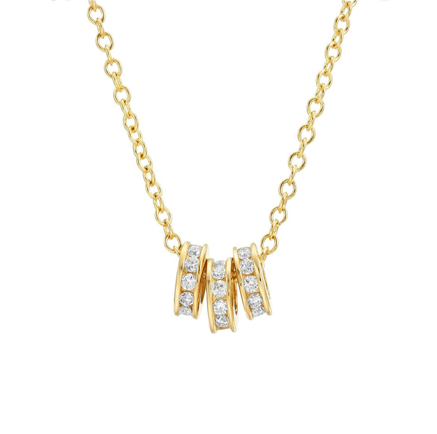 Yellow gold round diamond charm necklace