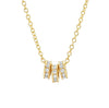 Yellow gold round diamond charm necklace