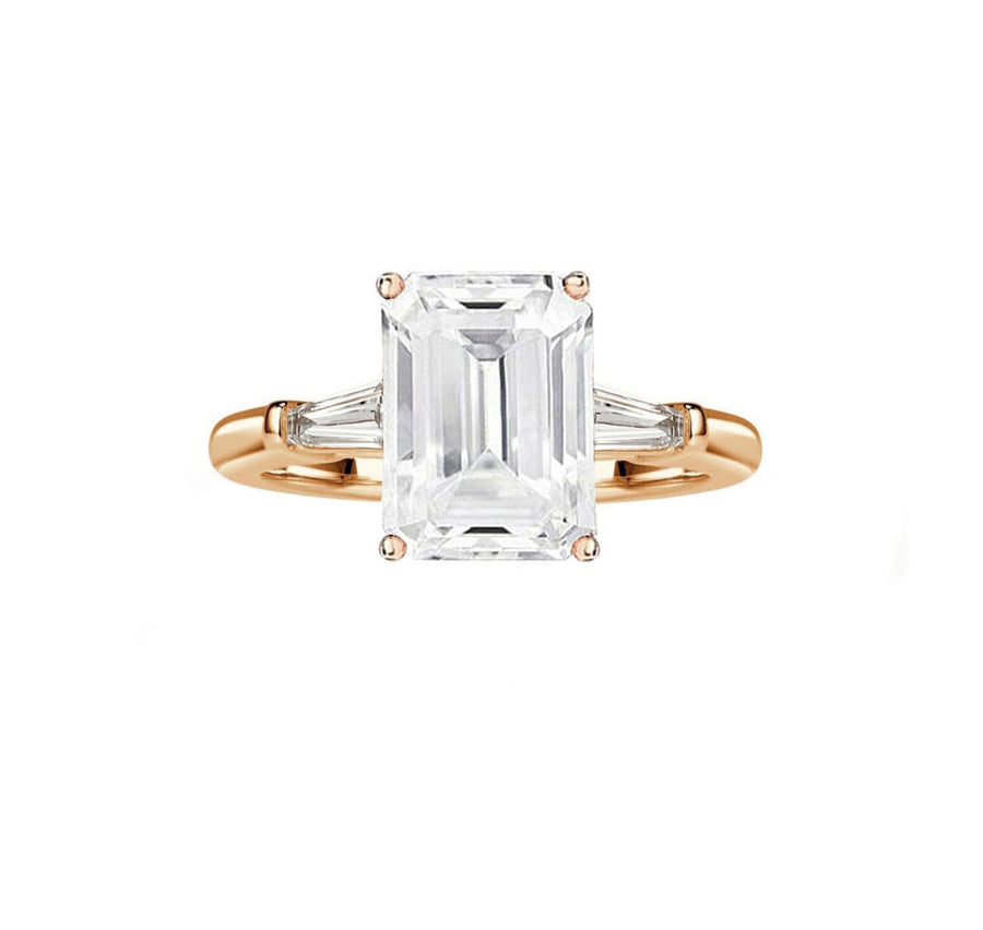 Tapered baguette emerald cut diamond engagement ring in rose gold