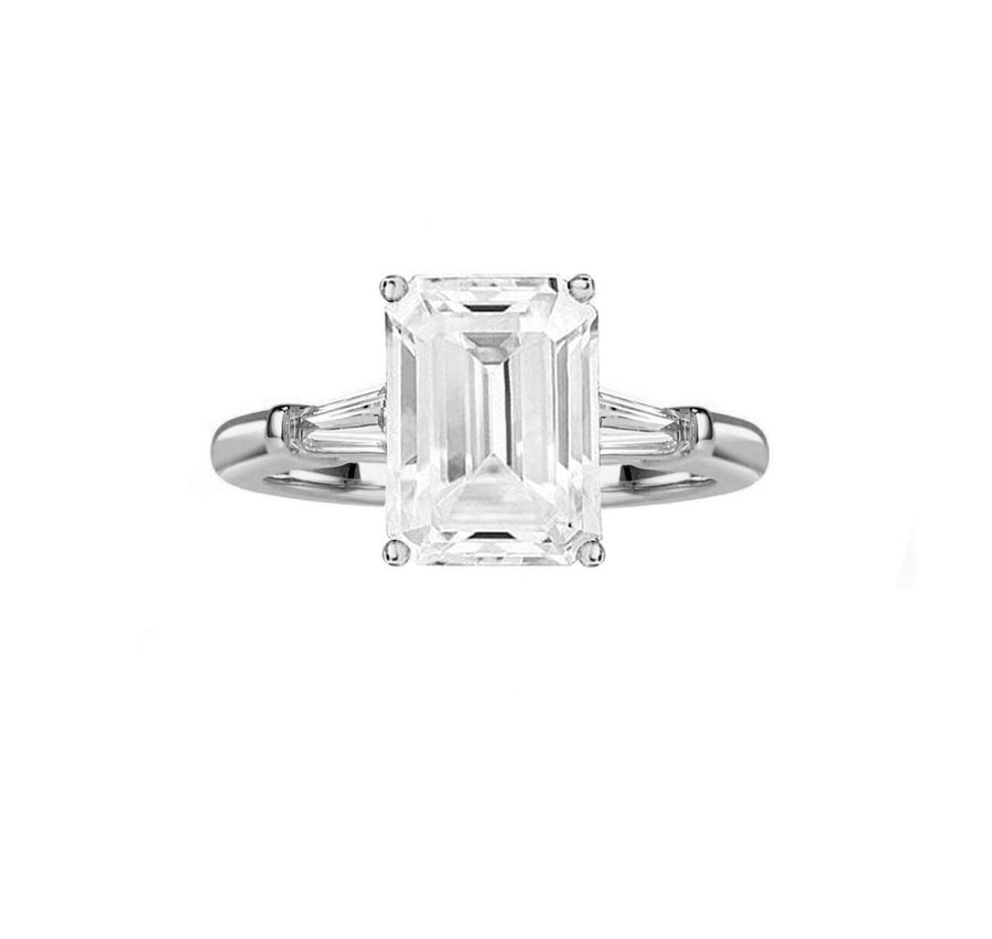 Tapered baguette emerald cut diamond engagement ring in white gold